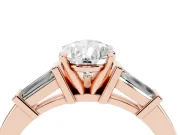 Pear Cut Diamond Solitaire Ring Set in Rose gold with Tapered Baguette Accents and Prong Setting