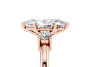 Three-Stone Marquise Cut Diamond Ring Set in Rose gold with Prong Setting and Plain Band