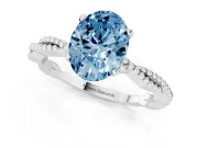 Fancy Blue Oval Cut Diamond Solitaire Ring Set in White gold with Twisted Band and Bead Prong Setting