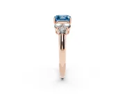 Fancy Blue Asscher Cut Diamond Cluster Ring Set in Rose gold with Round Accent Stones and Prong Setting on a Plain Band