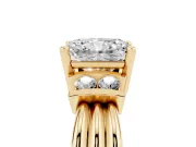 Three-Stone Radiant Cut Diamond Channel Set Ring Set in Yellow gold with Bar Prongs