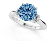 Fancy Blue Three-Stone Round Cut Diamond Ring Set in White gold with Prong Setting and Plain Band