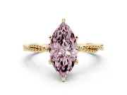 Fancy Pink Marquise Cut Diamond Solitaire Ring Set in Yellow gold with Twisted Band and Bead Prong Setting