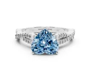 Fancy Blue Heart Cut Diamond Solitaire Engagement Ring Set in Platinum with Twisted Pavé Band and Prong Setting