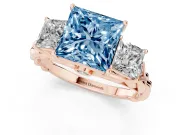 Fancy Blue Princess Cut Diamond Three-Stone Ring Set in Rose gold with Braided Band