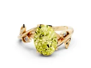 Fancy Yellow Oval Cut Diamond Solitaire Twist Engagement Ring Set in Yellow gold with Pavé Leaf Accents
