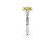 Fancy Yellow Radiant Cut Diamond Halo Engagement Ring Set in Platinum with Pavé Band and Prong Setting