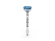 Fancy Blue Radiant Cut Diamond Solitaire Ring Set in Platinum with Round Pavé Band and Prong Setting