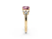 Fancy Pink Princess Cut Diamond Cluster Ring Set in Yellow gold with Round Accent Stones and Prong Setting on a Plain Band
