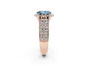 Fancy Blue Oval Cut Diamond Halo Ring Set in Rose gold with Pavé Band and Raised Center Setting