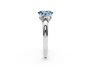 Fancy Blue Oval Cut Diamond Three-Stone Ring Set in Silver with Bold Center and Classic Band