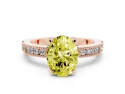 Fancy Yellow Oval Cut Diamond Solitaire Ring Set in Rose gold with Slim Pavé Band and Prong Setting