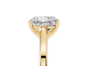 Radiant Cut Diamond Solitaire Ring Set in Yellow gold with Prong Setting and Classic Band