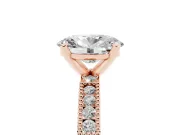 Oval Cut Diamond Solitaire Ring Set in Rose gold with Slim Pavé Band and Prong Setting