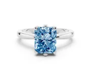Fancy Blue Radiant Cut Diamond Solitaire Engagement Ring Set in White gold with Slim Tapered Solitaire Band