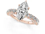 Marquise Cut Diamond Solitaire Ring Set in Rose gold with Shared Prong Pavé Band
