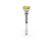 Fancy Yellow Three-Stone Radiant Cut Diamond Pavé Band Ring Set in White gold with Prong-Set Trio