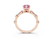 Fancy Pink Cushion Cut Diamond Solitaire Ring Set in Rose gold with Bezel Set Side Stones and Prong Setting