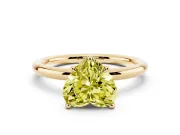 Fancy Yellow Heart Cut Diamond Solitaire Ring Set in Yellow gold with Thin Band and Prong Setting