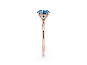 Fancy Blue Round Cut Diamond Solitaire Engagement Ring Set in Rose gold with Thin Band and Prong Setting