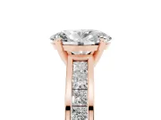 Oval Cut Diamond Solitaire Ring Set in Rose gold with Channel-Set Band and Prong Setting