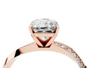 Radiant Cut Diamond Engagement Ring Set in Rose gold with Side Stone Accents and Prong Setting