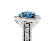 Fancy Blue Heart Cut Diamond Halo Ring Set in Platinum with Round Accent Halo, Pavé Band and Prong Setting