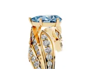 Fancy Blue Pear Cut Diamond Solitaire Ring Set in Yellow gold with Layered Twist Pavé Band