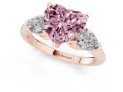 Fancy Pink Three-Stone Heart Cut Diamond Ring Set in Rose gold with Pear Side Stones and Prong Setting