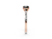 Fancy Black Cushion Cut Diamond Solitaire Set in Rose gold with Side Baguettes and Channel Set Band