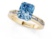 Fancy Blue Radiant Cut Diamond Solitaire Ring Set in Yellow gold with Channel-Set Baguette Band and Prong Setting