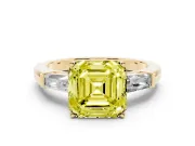 Fancy Yellow Asscher Cut Diamond Solitaire Ring Set in Yellow gold with Tapered Baguette Side Stones and Prong Setting