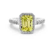 Fancy Yellow Emerald Cut Diamond Halo Engagement Ring Set in Silver with Pavé Band and Prong Setting