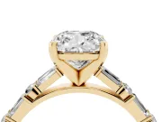 Cushion Cut Diamond Solitaire Set in Yellow gold with Side Baguettes and Channel Set Band