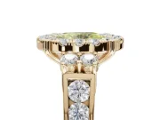 Oval Halo Engagement Ring Setting for a Fancy Yellow Lab-Grown Diamond | Side Clusters | Yellow Gold