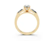 Emerald Cut Diamond Solitaire Ring Set in Yellow gold with Tapered Baguette Side Stones and Prong Setting