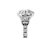 Round Cut Diamond Three-Stone Ring Set in Silver with Pavé Band and Graduated Sides