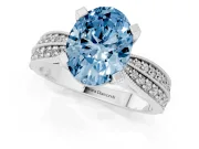 Fancy Blue Oval Cut Diamond Solitaire Ring Set in Platinum with Milgrain Double Row Round Pavé Band
