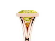 Fancy Yellow Bezel Set Radiant Cut Diamond Solitaire Ring Set in Rose gold with Tapered Band