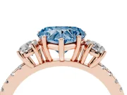 Fancy Blue Heart Cut Diamond Three-Stone Ring Set in Rose gold with Pavé Band and Graduated Sides