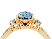 Fancy Blue Three-Stone Pear Cut Diamond Twist Band Ring Set in Yellow gold with Pavé Accents and Prong Setting