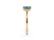 Fancy Blue Emerald Cut Diamond Solitaire Engagement Ring Set in Yellow gold with Prong Setting and Polished Band