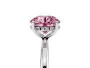 Fancy Pink Round Cut Diamond Solitaire Engagement Ring Set in Platinum with Prong Setting and Polished Band