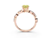 Fancy Yellow Oval Cut Diamond Solitaire Ring Set in Rose gold with Twisted Marquise Accent Band