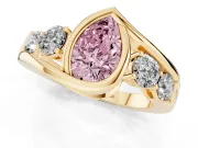 Fancy Pink Pear Cut Diamond Bezel Bypass Ring Set in Yellow gold with Round Accents