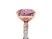 Fancy Pink Radiant Cut Diamond Solitaire Ring Set in Rose gold with Round Pavé Band and Prong Setting