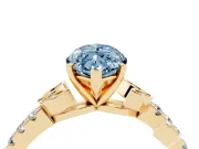Fancy Blue Marquise Cut Diamond Solitaire Leaf-Inspired Ring Set in Yellow gold with Pavé Band and Prong Setting
