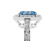 Fancy Blue Emerald Cut Diamond Halo Pavé Engagement Ring Set in White gold with Bezel Setting