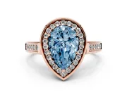 Fancy Blue Pear Cut Diamond Halo Solitaire Ring Set in Rose gold with Pavé Band and Bezel Setting