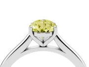 Fancy Yellow Pear Cut Diamond Solitaire Ring Set in White gold with Cathedral Band and Prong Setting